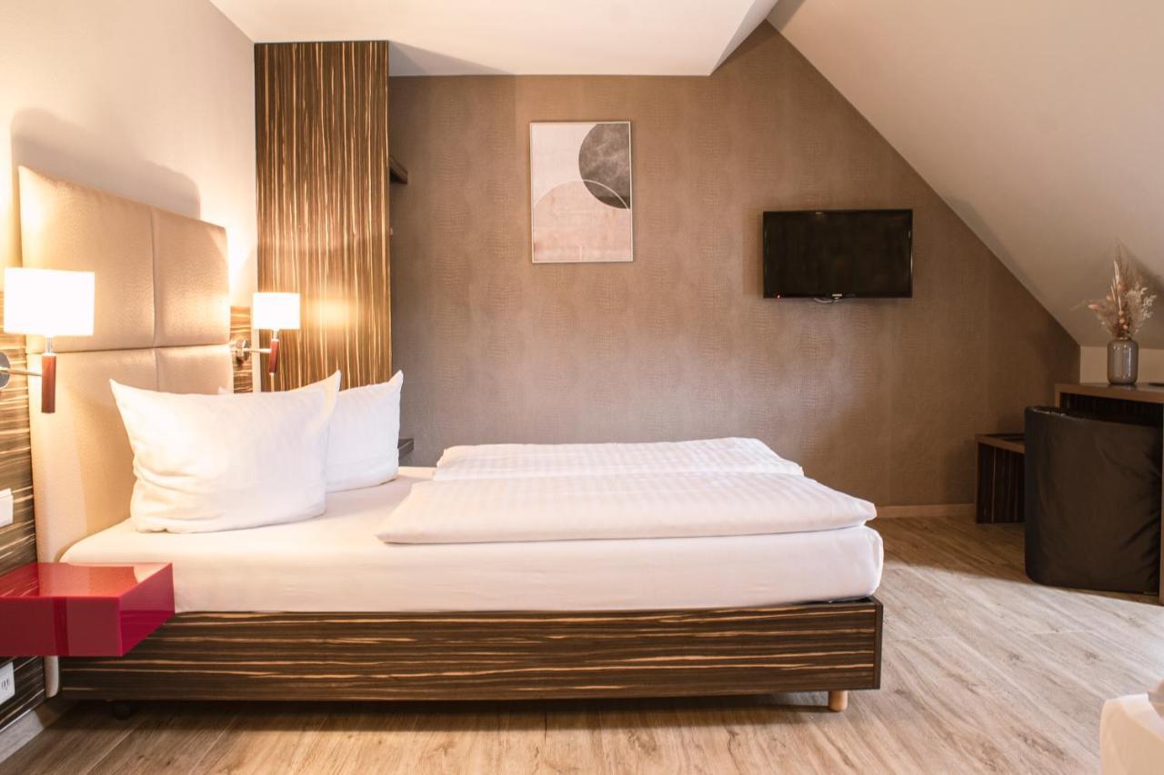 Arkade Hotel Am Theater ไฮล์บรอนน์ ภายนอก รูปภาพ